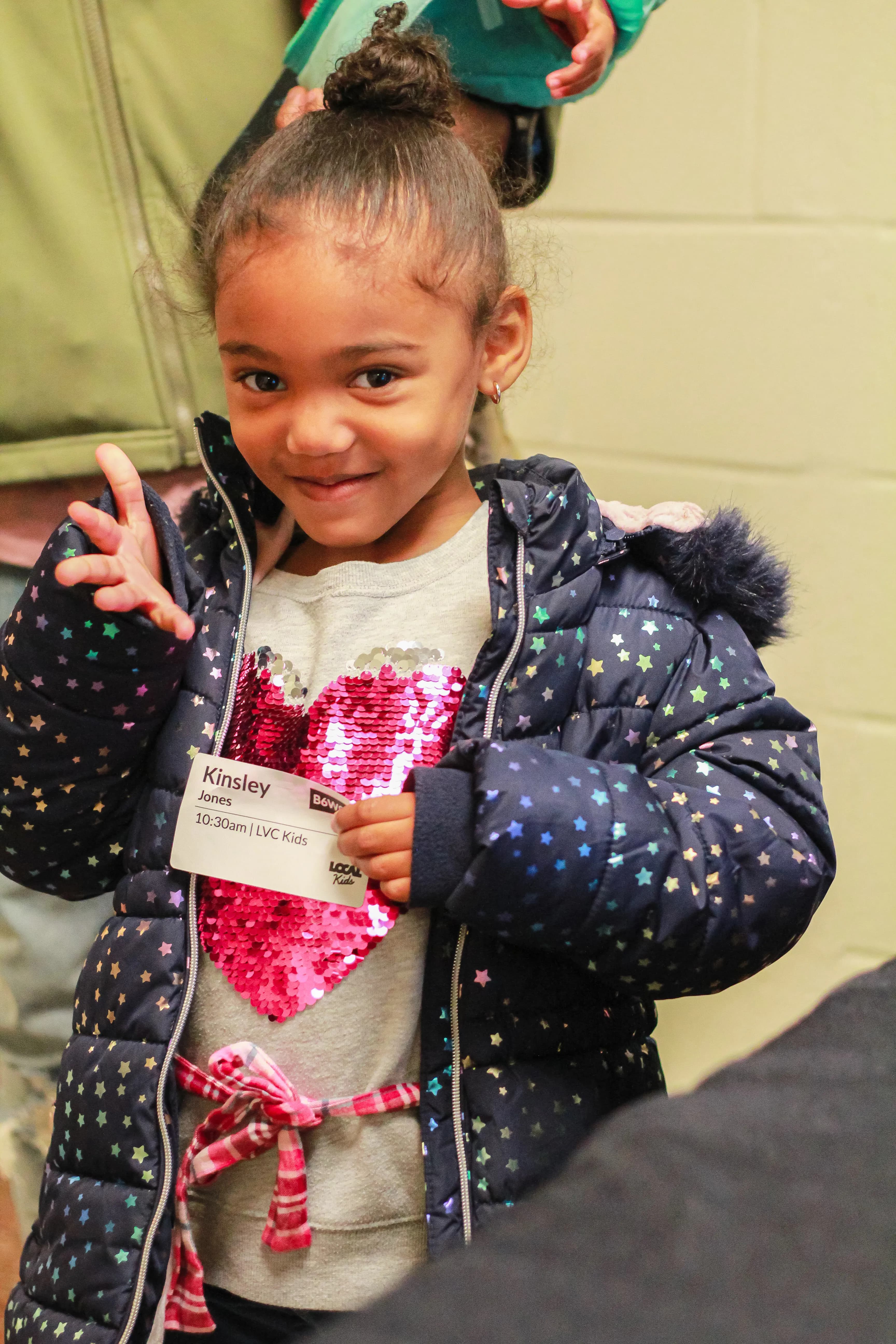 A child being checked in for church